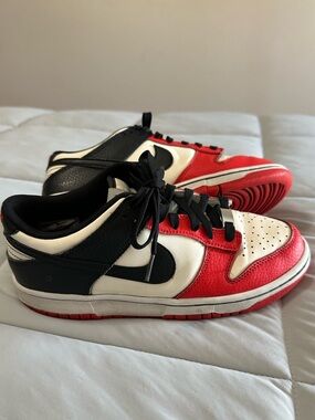 Limited edition Kids NBA x Nike Dunk Low EMB 75th Anniversary sneaker.